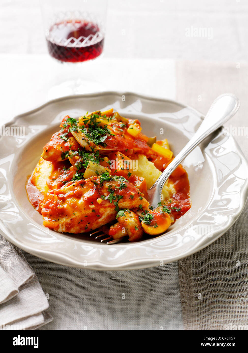 Chicken Tavolo Plate of chicken in tomato sauce Stock Photo - Alamy
