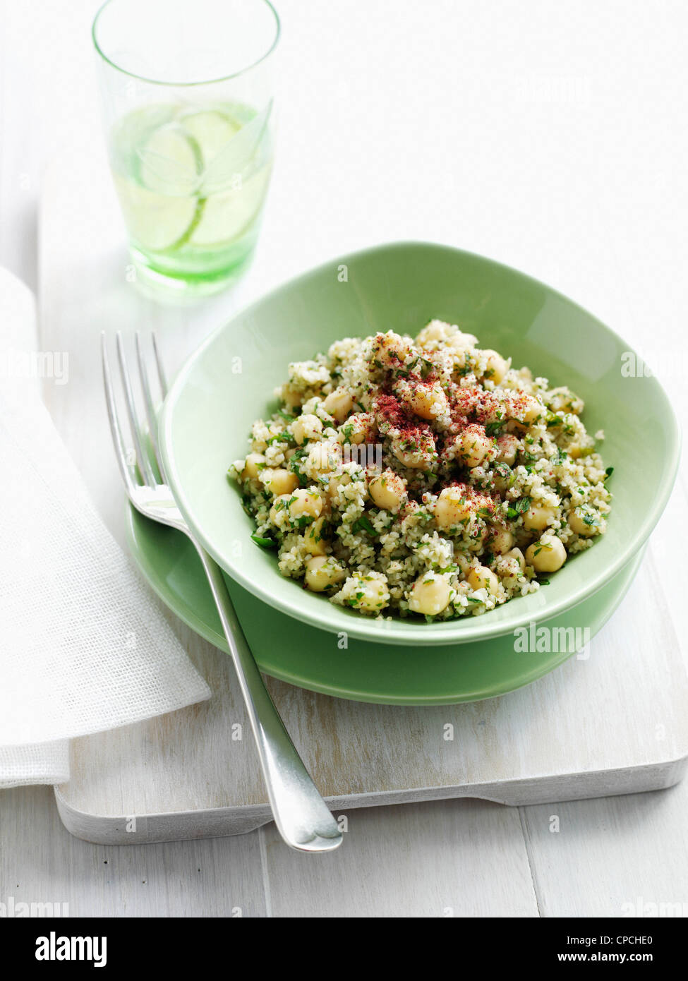 Bowl of herbed couscous Stock Photo Alamy