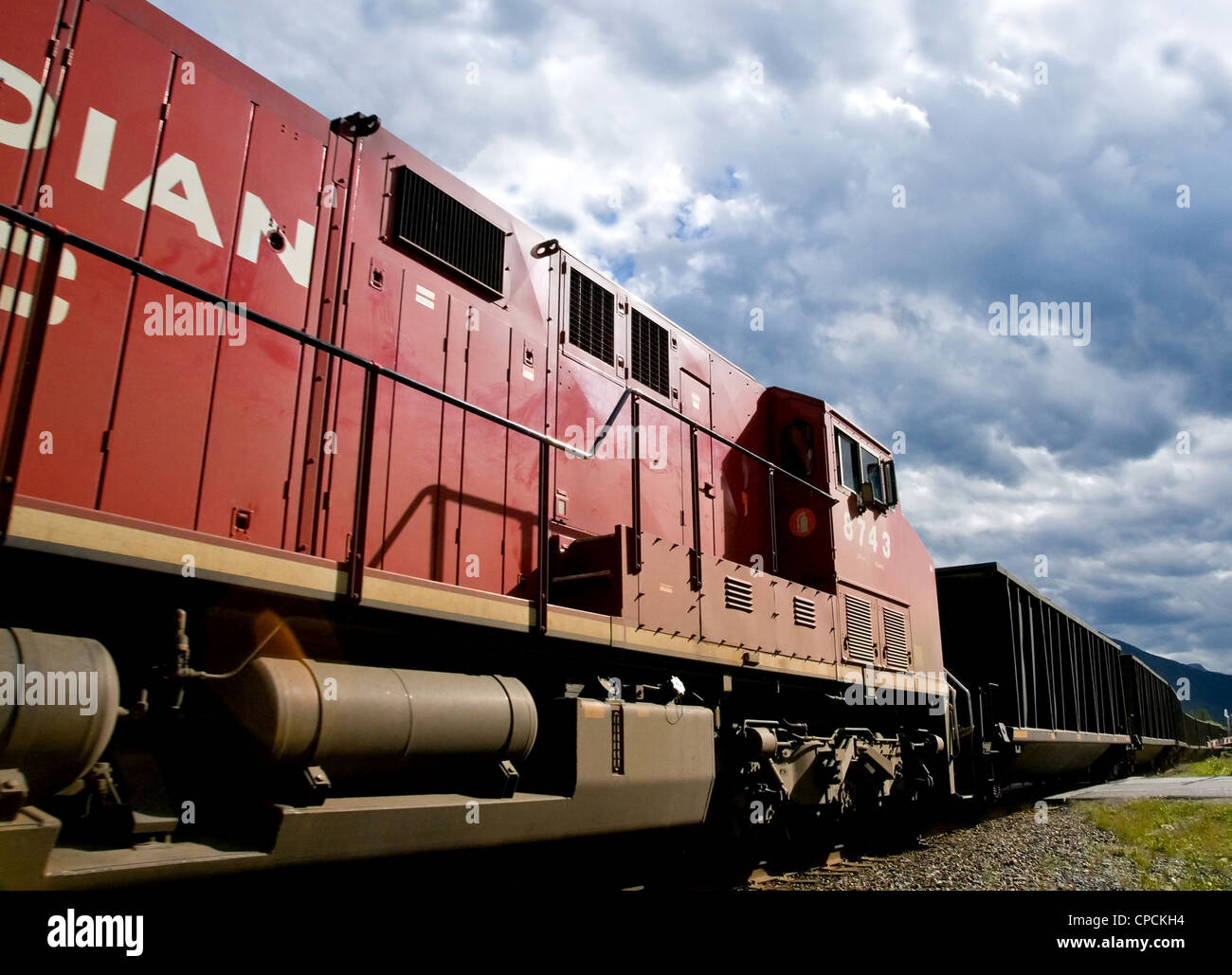 A Canadian Pacific AC44 travelling through Banff Station, Alberta, Canada Stock Photo