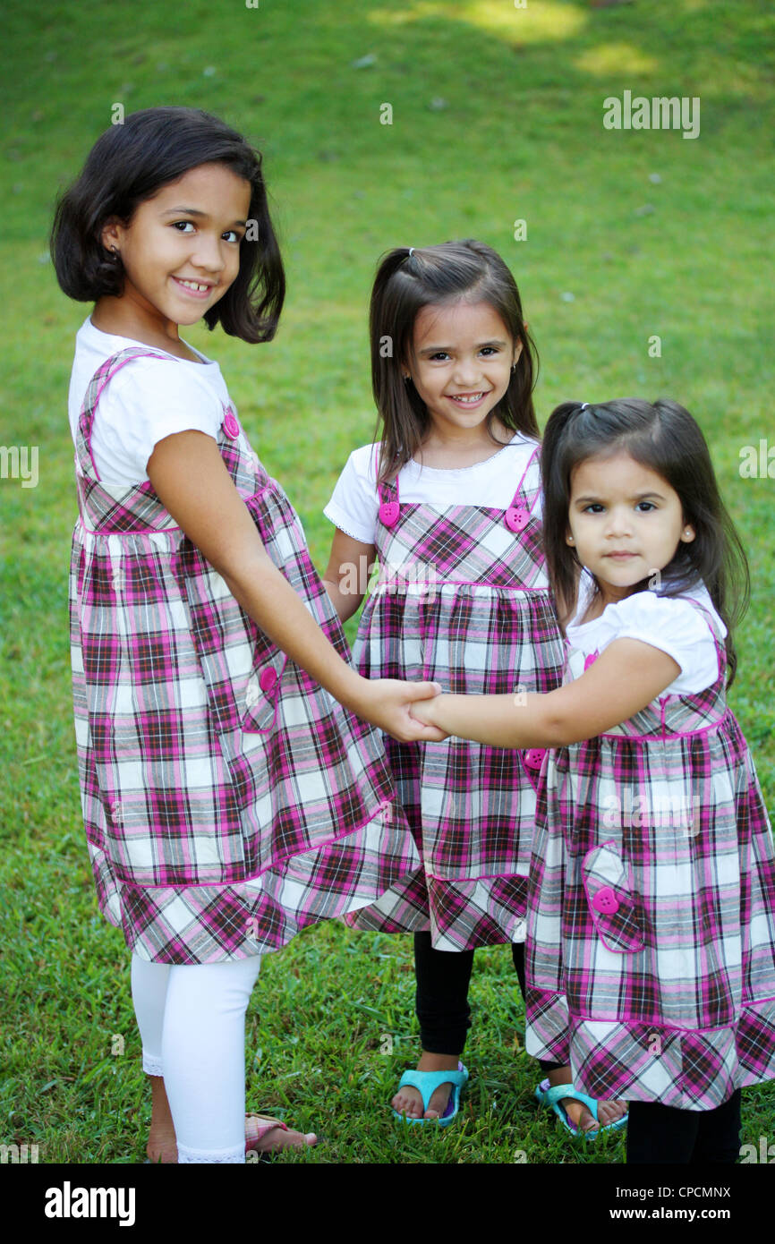 Sisters Outside Their Home In The Summer Stock Photo - Alamy