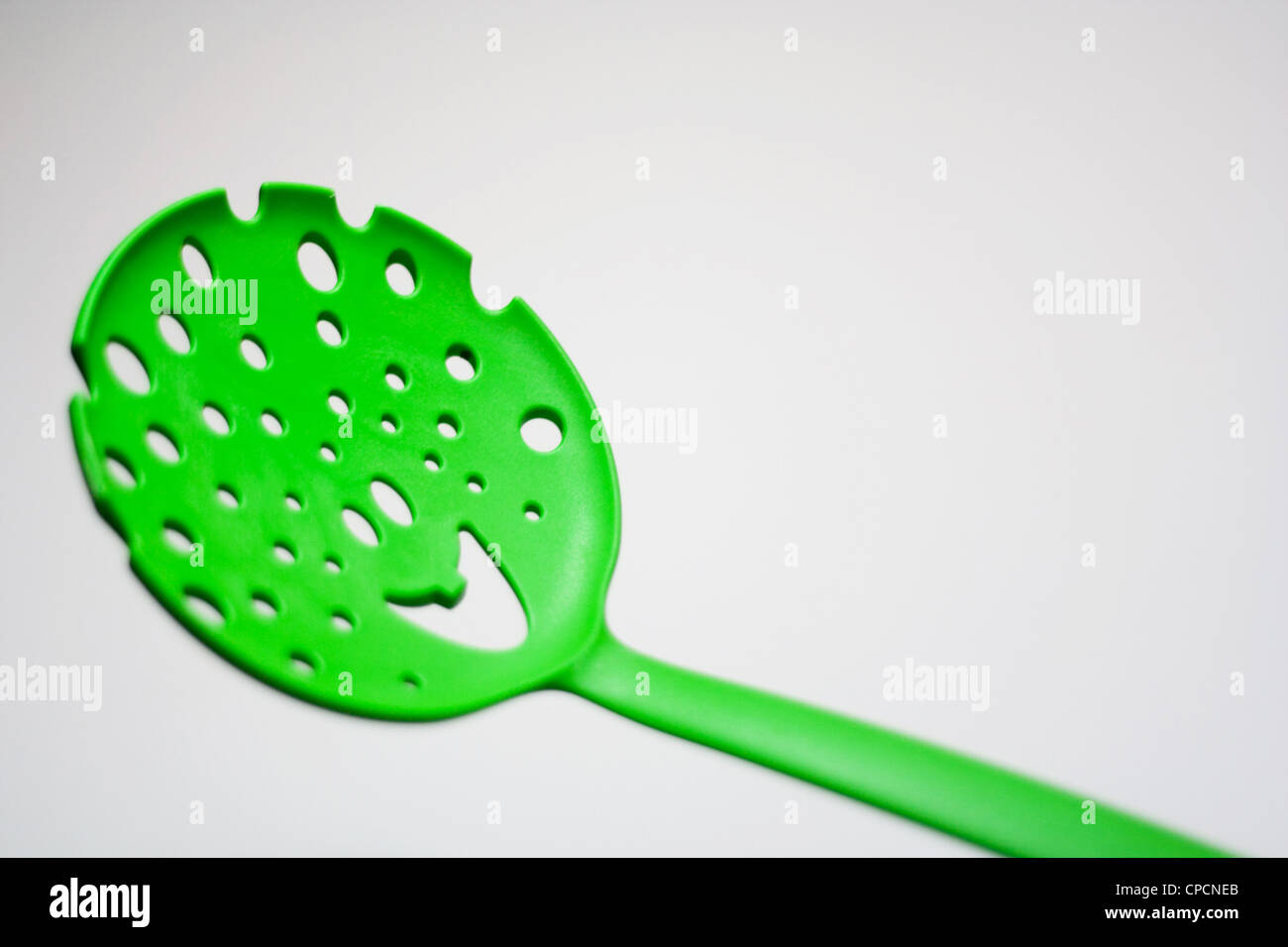 A smiling spoon on white background Stock Photo - Alamy