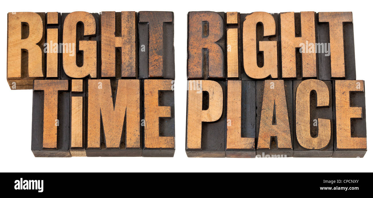 right time, right place - opportunity concept - isolated phrase in vintage letterpress wood type Stock Photo