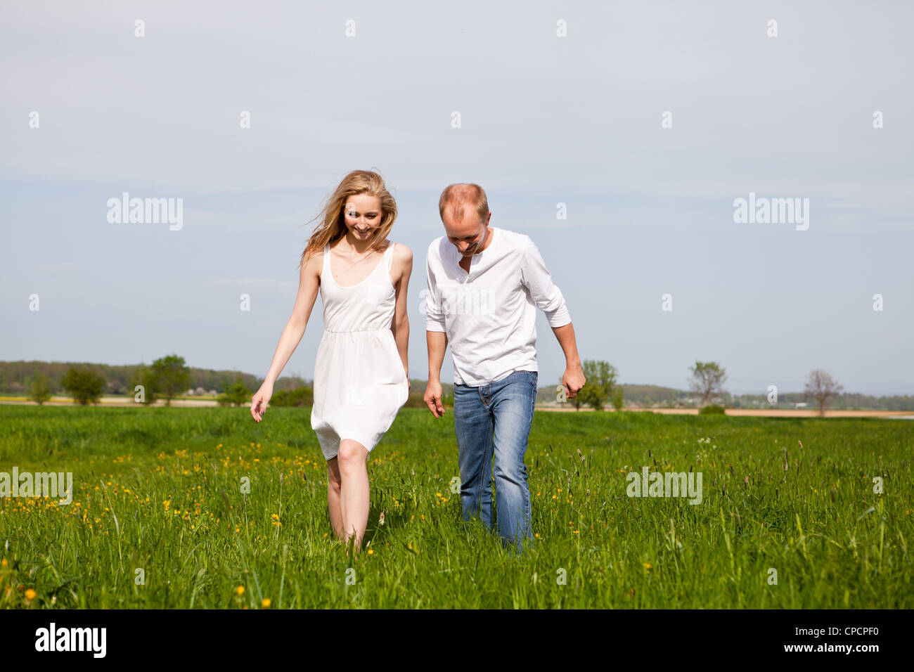 young happy couple have fun in summer outdoor in nature Stock Photo - Alamy
