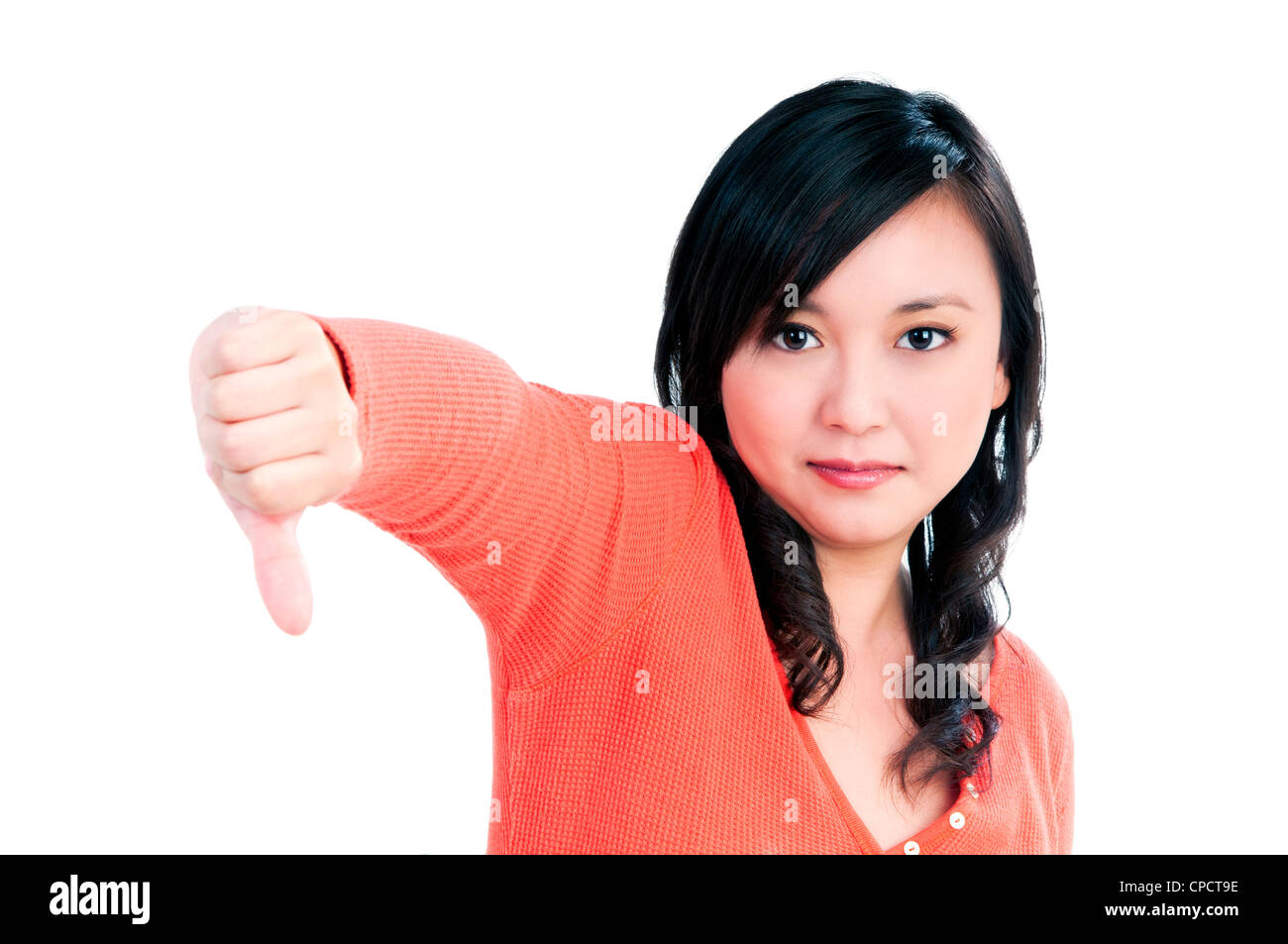 Cute woman showing thumbs down sign Stock Photo