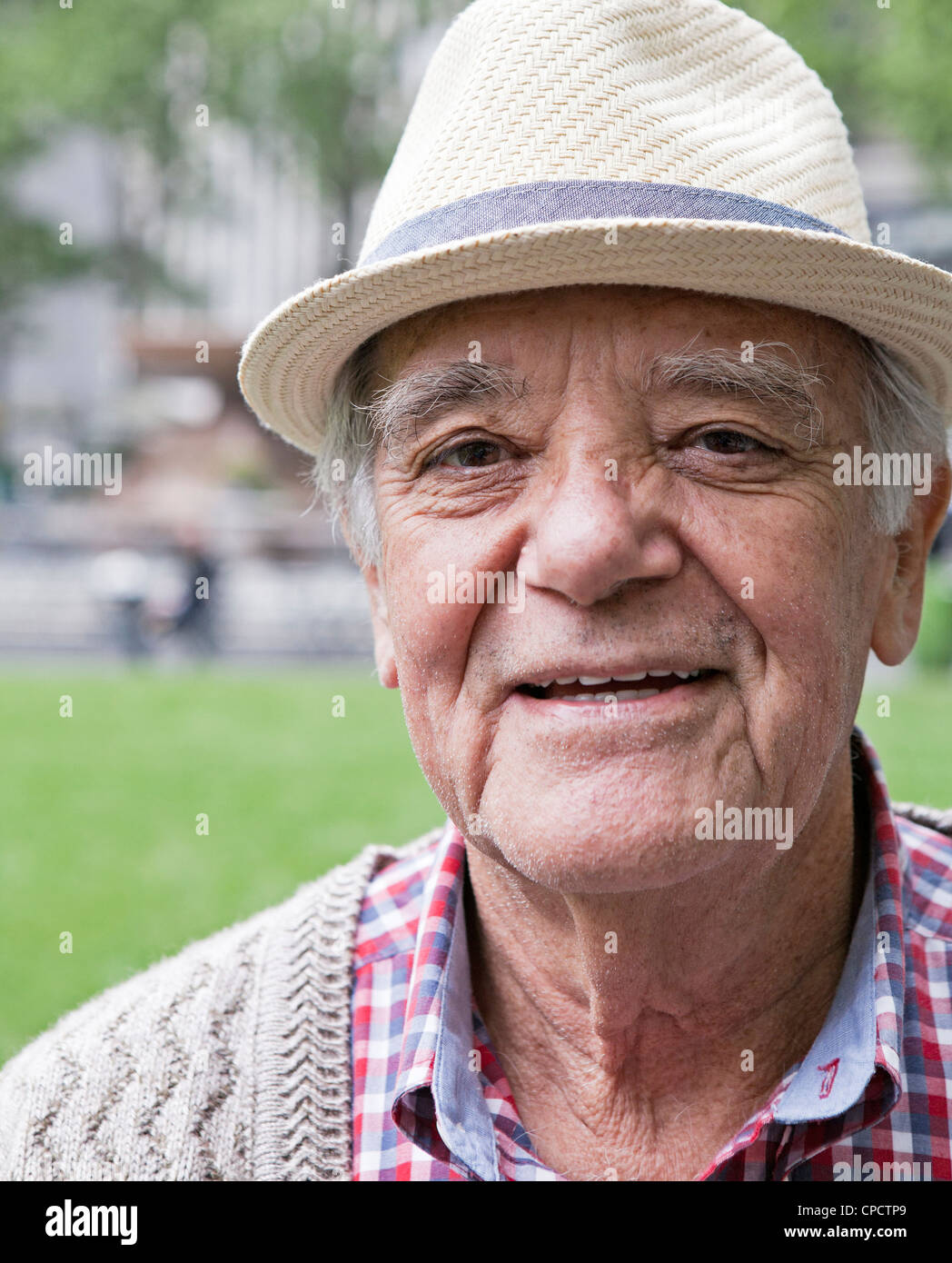 A man visiting from Mexico poses in Bryant Park in New York City. Stock Photo