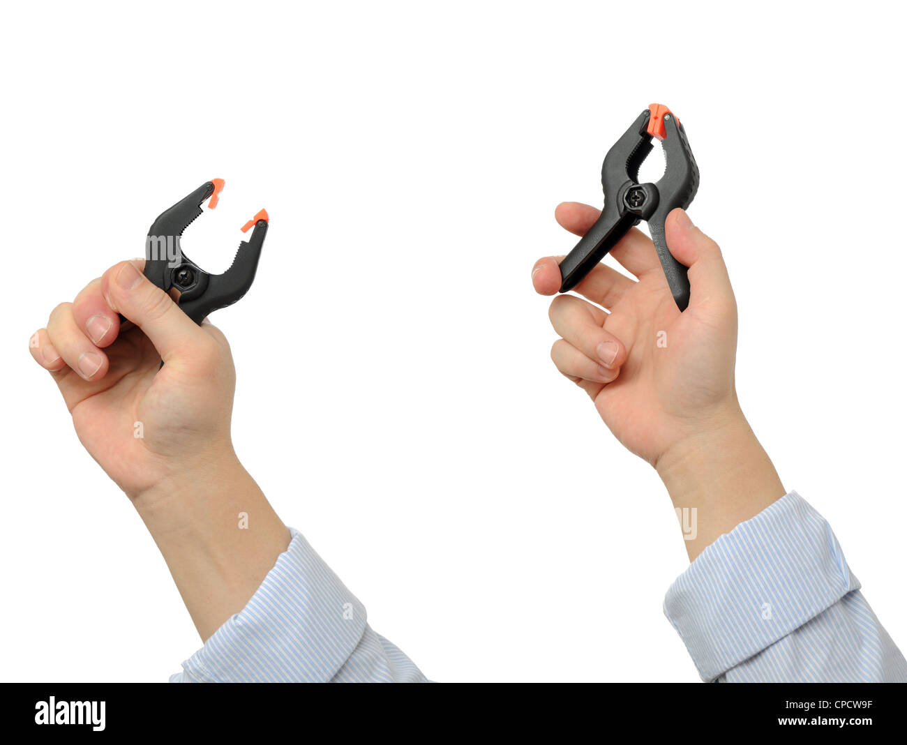 Business man holding spring clamp Stock Photo Alamy