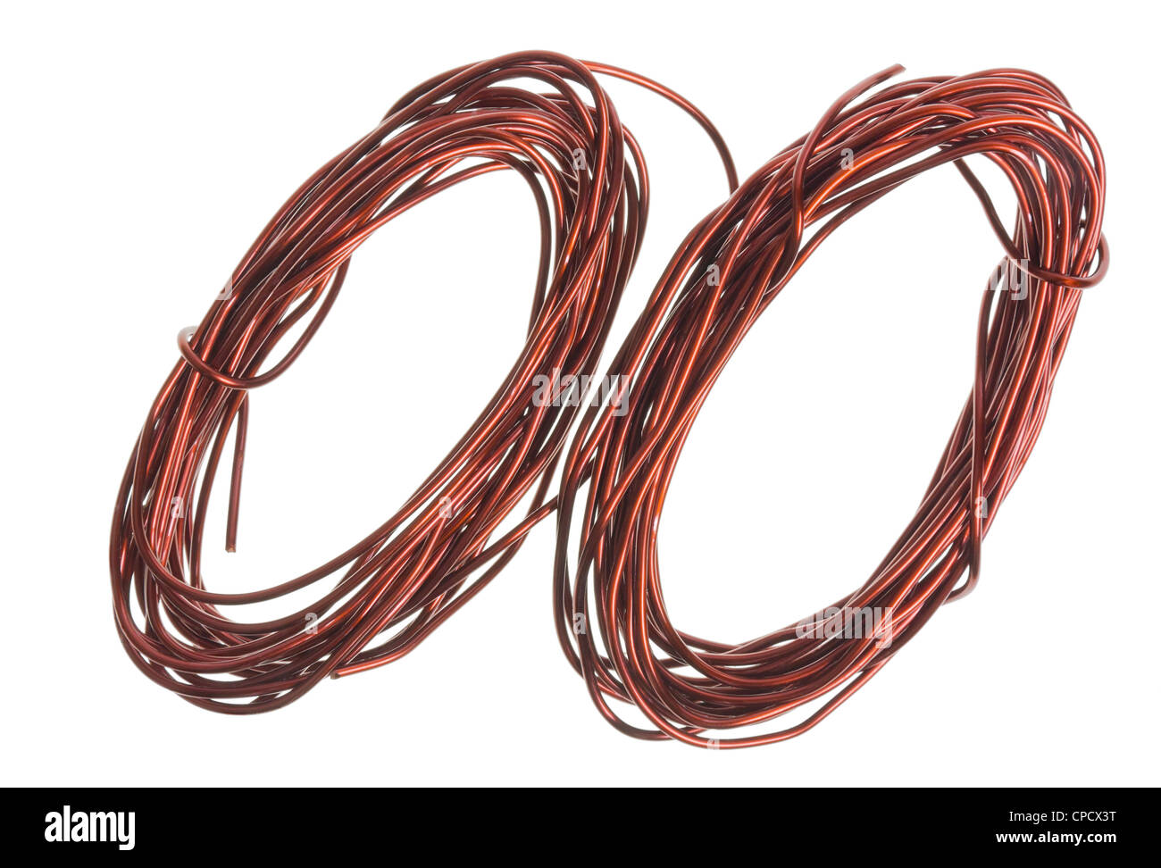 Winding enamelled copper wires for electrical circuits isolated macro. Slective focus Stock