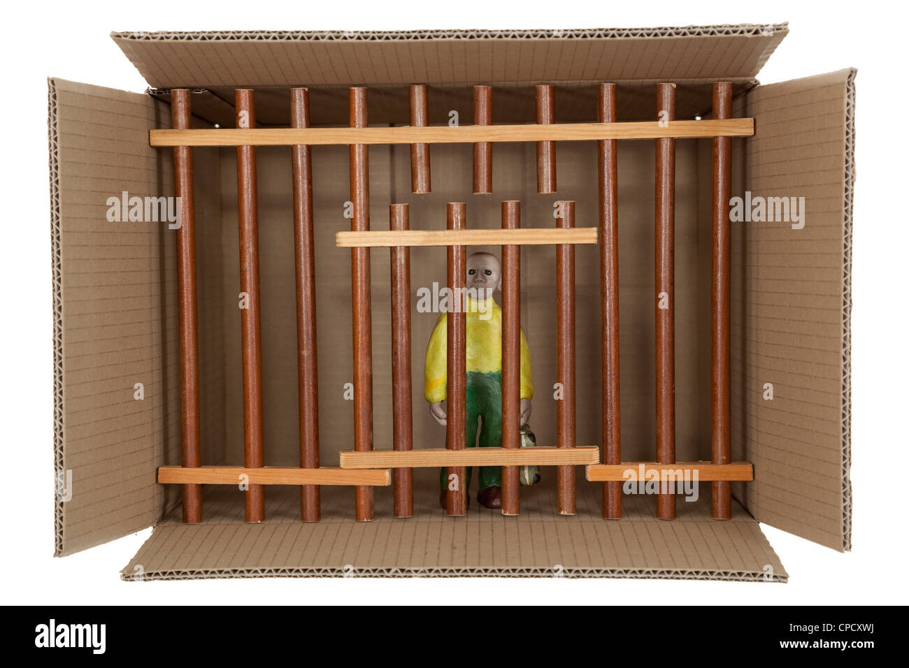 plasticine man with suitcase sits in box Stock Photo