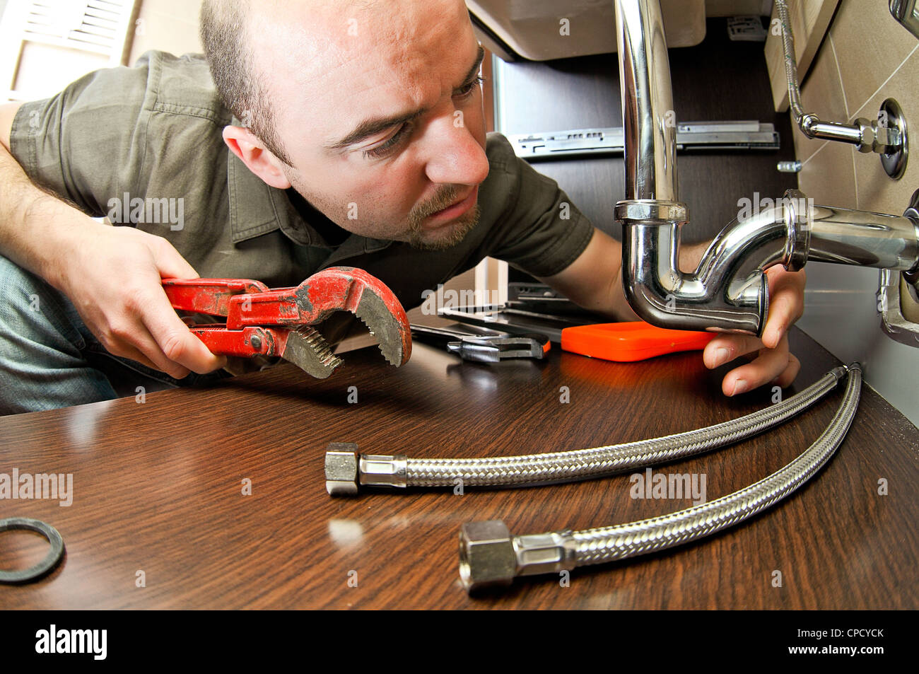funny portrait of caucasian plumber on duty Stock Photo - Alamy