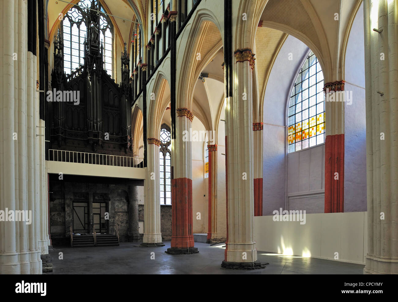 Renovated interior with columns painted in original colours of the Saint Nicholas' Church / Sint-Niklaaskerk in Ghent, Belgium Stock Photo