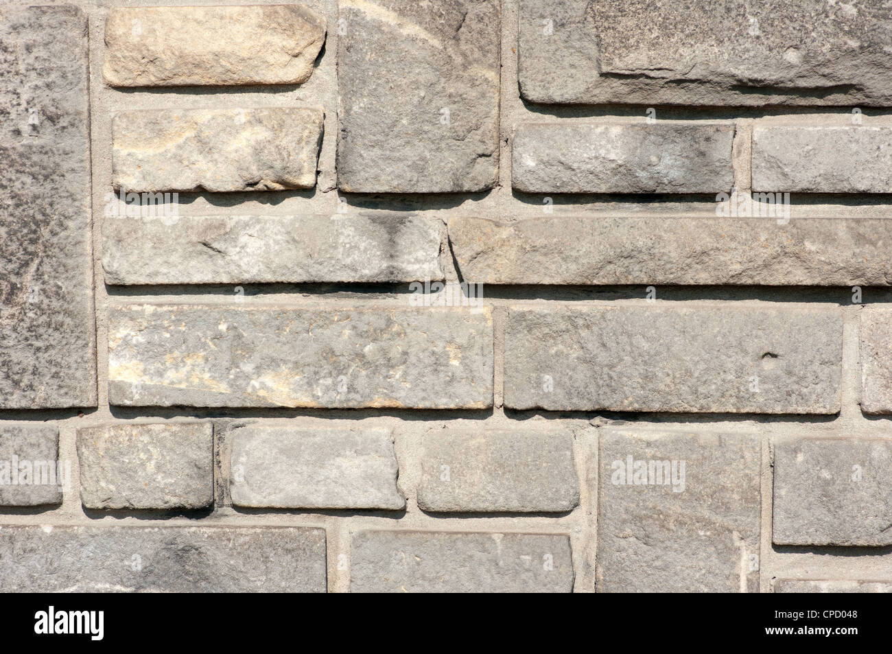 Thick stone wall of the building. Stock Photo