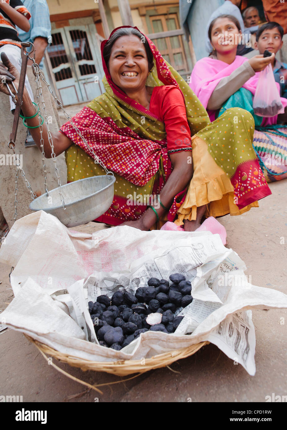 Water chestnuts seller (Eleocharis dulcis), Vadodara, Gujarat, India, Asia Stock Photo