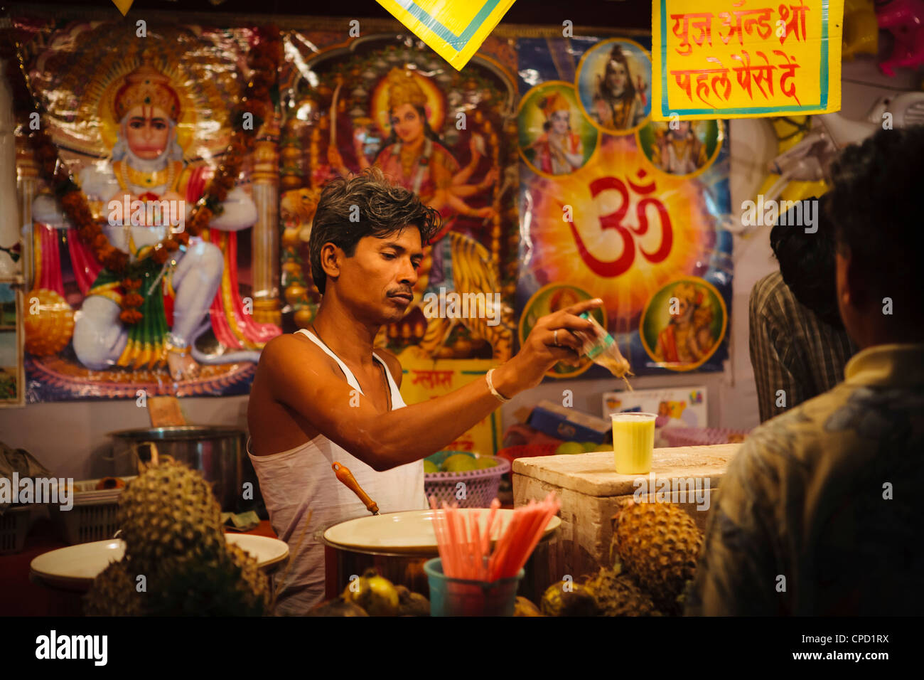 Hindu fruit juice stall at local rural fair, Sejpur, Gujarat, India