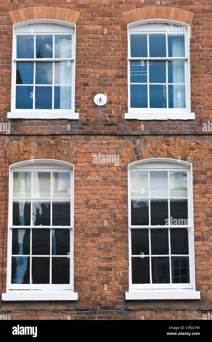 Double-hung sash windows of Georgian town house in Ludlow Shropshire England UK Stock Photo