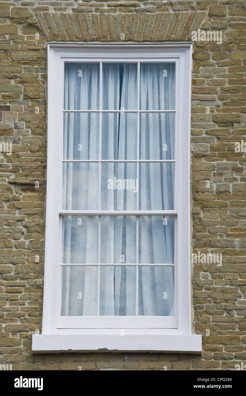 Double-hung sash windows of Georgian town house in Ludlow Shropshire England UK Stock Photo