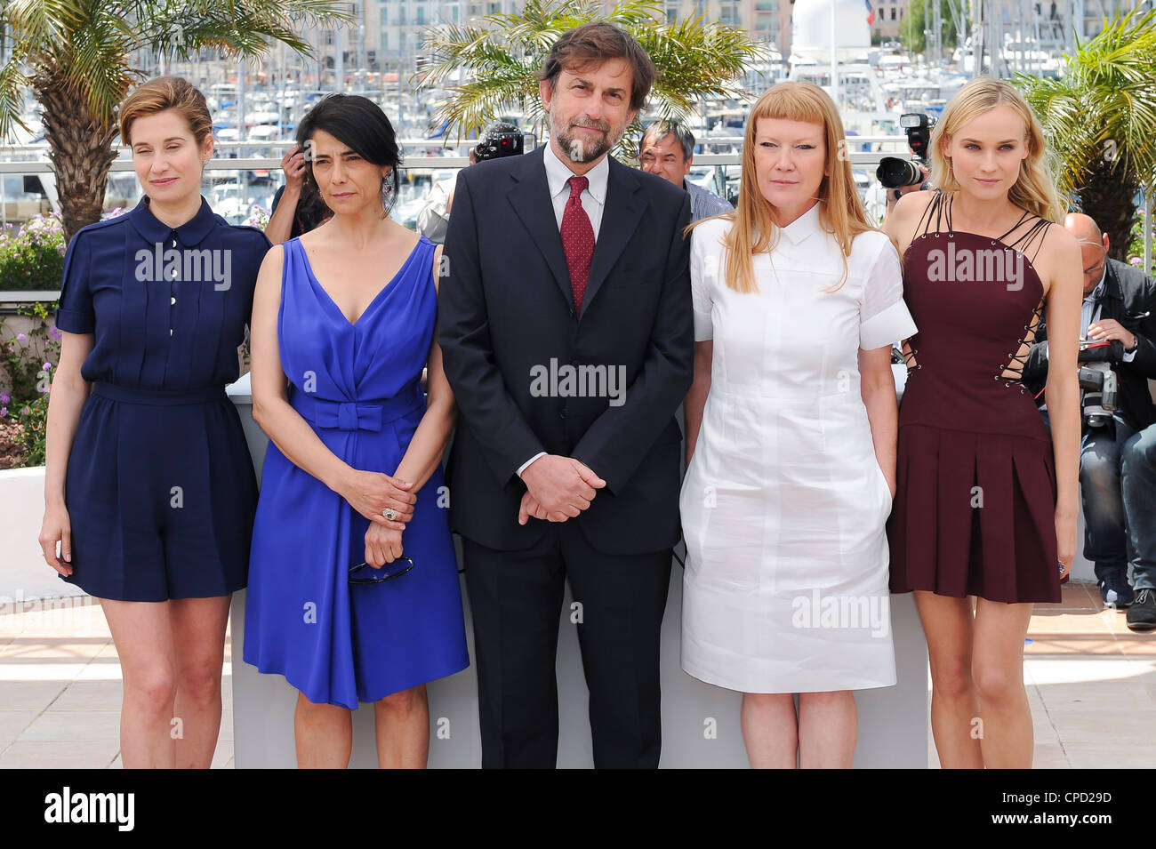 Diane Kruger, Andrea Arnold, Nanni Moretti, Hiam Abbass, and Emmanuelle Devos pose during a photo call in Cannes. Stock Photo