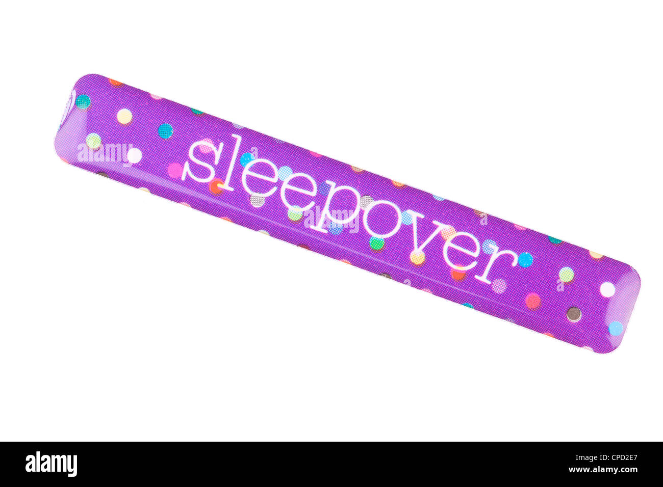 A peel off sticker with the word sleepover Stock Photo - Alamy
