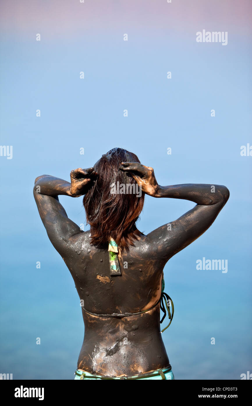 Woman covered in mud hi-res stock photography and images - Alamy
