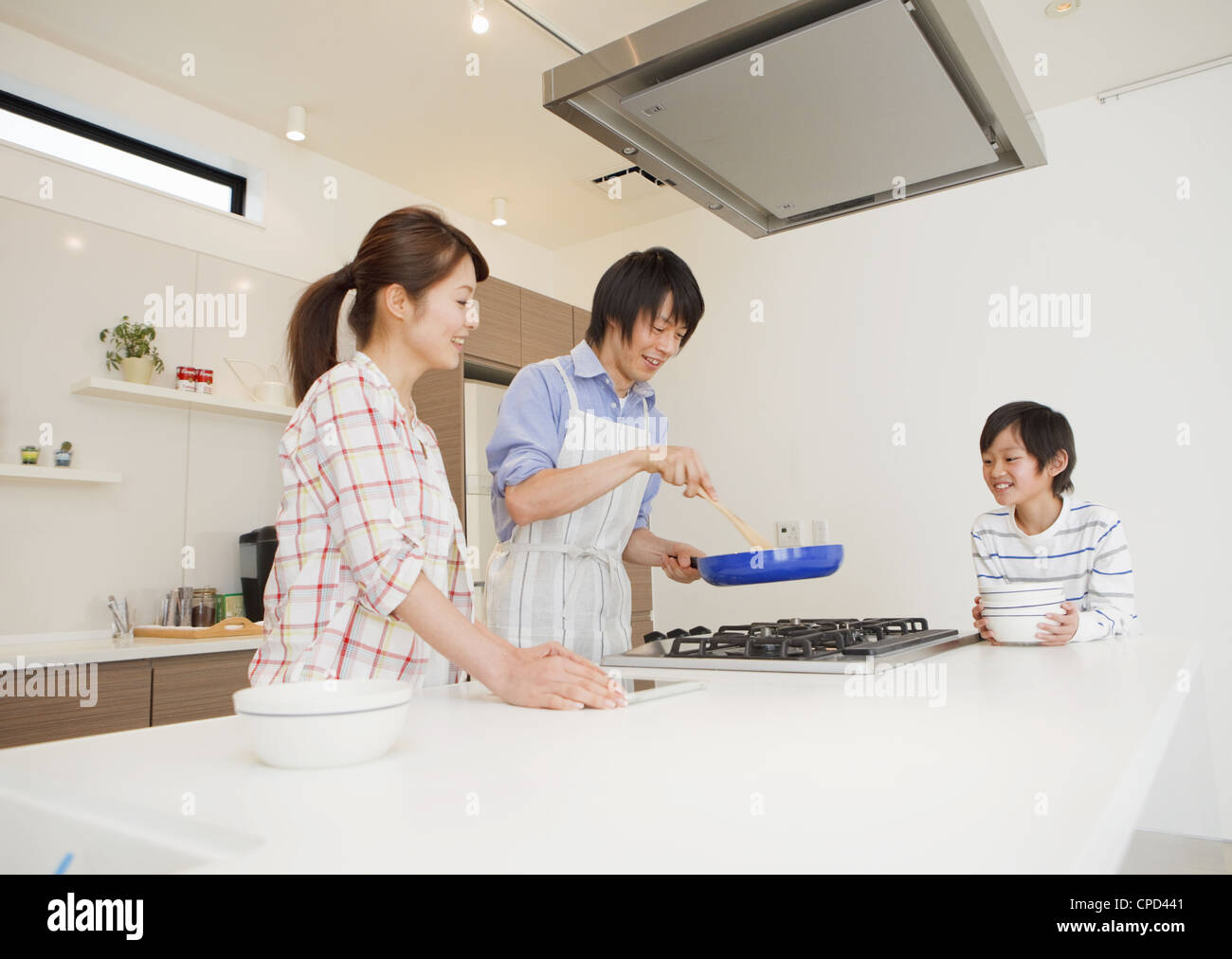 Mature woman cooking with child hi-res stock photography and images - Alamy