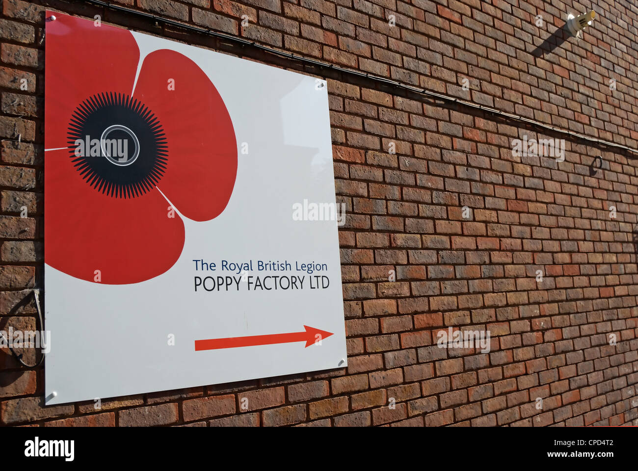 sign and direction marker for the royal british legion poppy factory, richmond, surrey, england Stock Photo