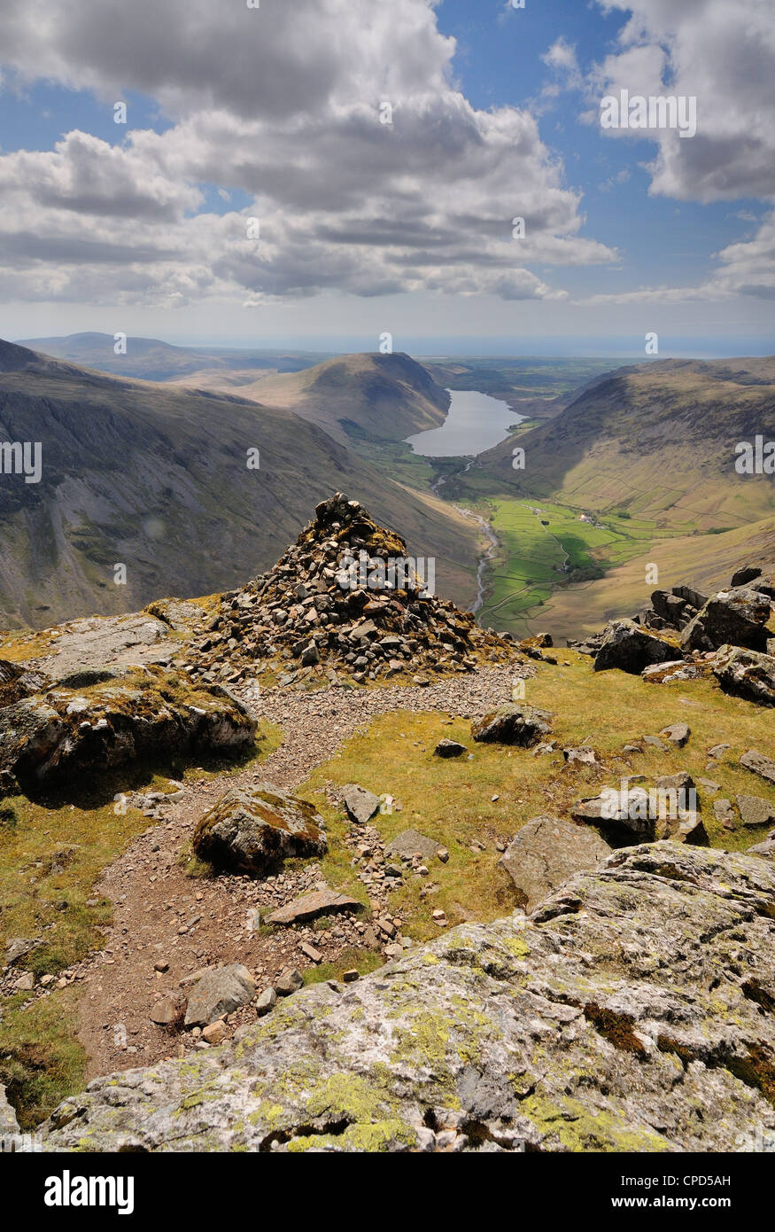 View from the summit of Great Gable over the Westmorland Cairn towards Wasdale and Wastwater in the English Lake District Stock Photo