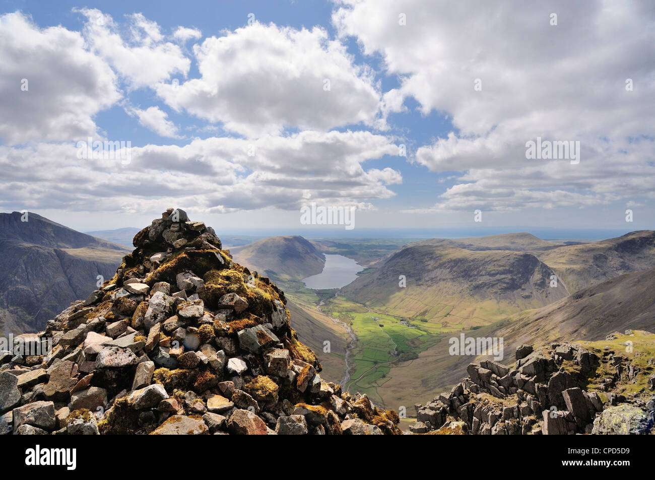 The Westmorland Cairn on the summit of Great Gable in the English Lake District, with Wasdale and Wastwater in the background Stock Photo