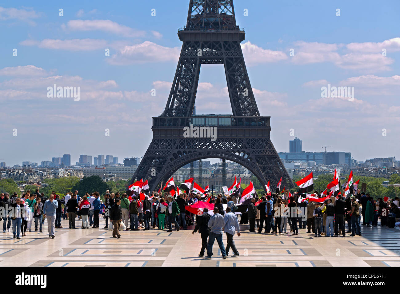 Supporters of Syrian President Assad demonstrate in front of the Eiffel Tower in Paris on May 13, 2012 Stock Photo