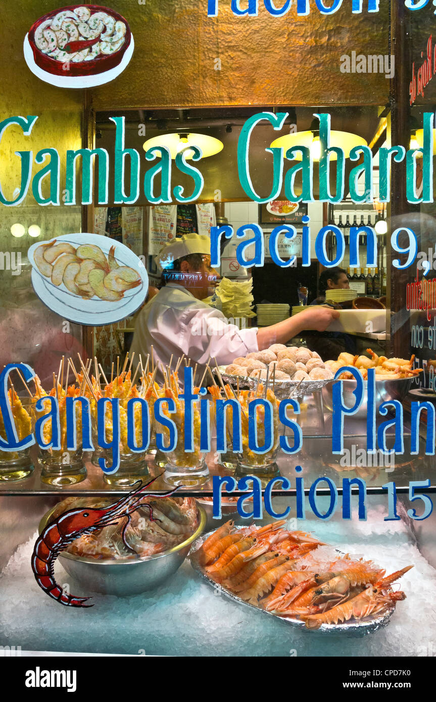 Looking through the window of a Tapas bar near the Plaza de Santa Ana