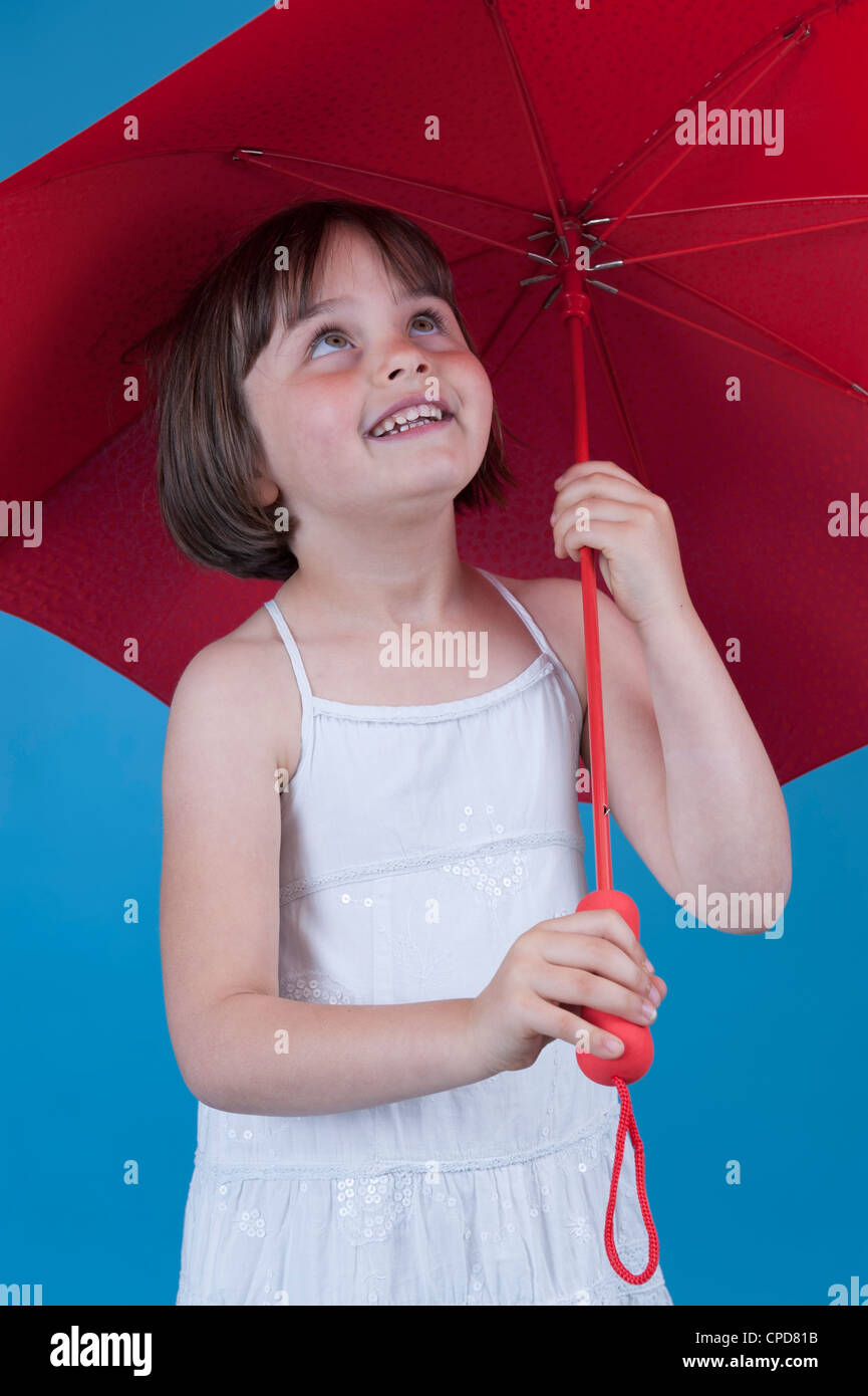 little girl with red umbrella Stock Photo - Alamy
