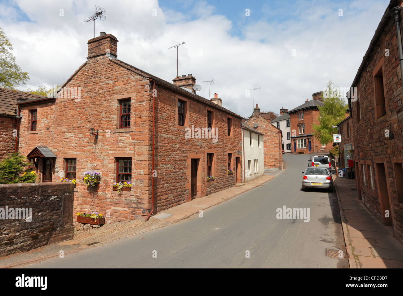 The main street Kirkoswald in the Eden Valley Cumbria, England, UK