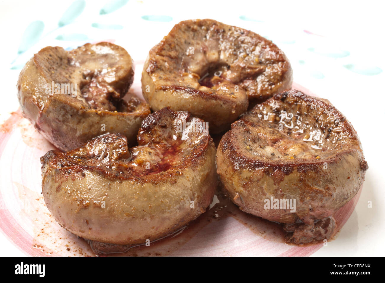 Pan fried lamb kidneys Stock Photo Alamy