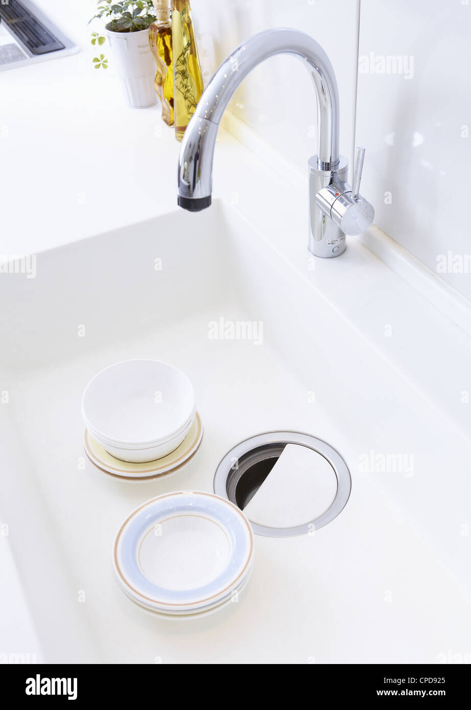 Dishes in the sink Stock Photo Alamy