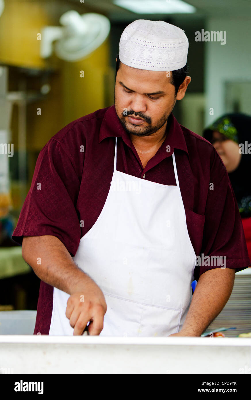 A cook in an Indian restaurant in Penang, Malaysia Stock Photo - Alamy