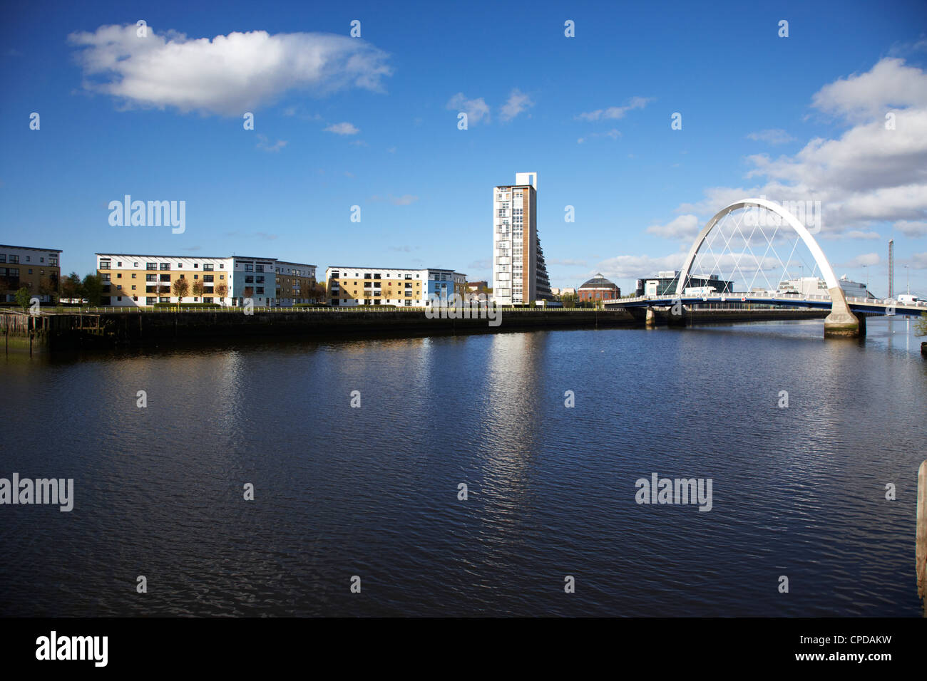 The Clyde Arc bridge over the river clyde and riverside apartments in