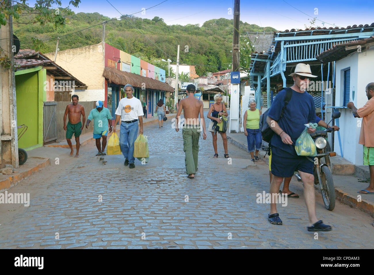 Pipa Brazil people busy in motion shopping in town center sunny evening