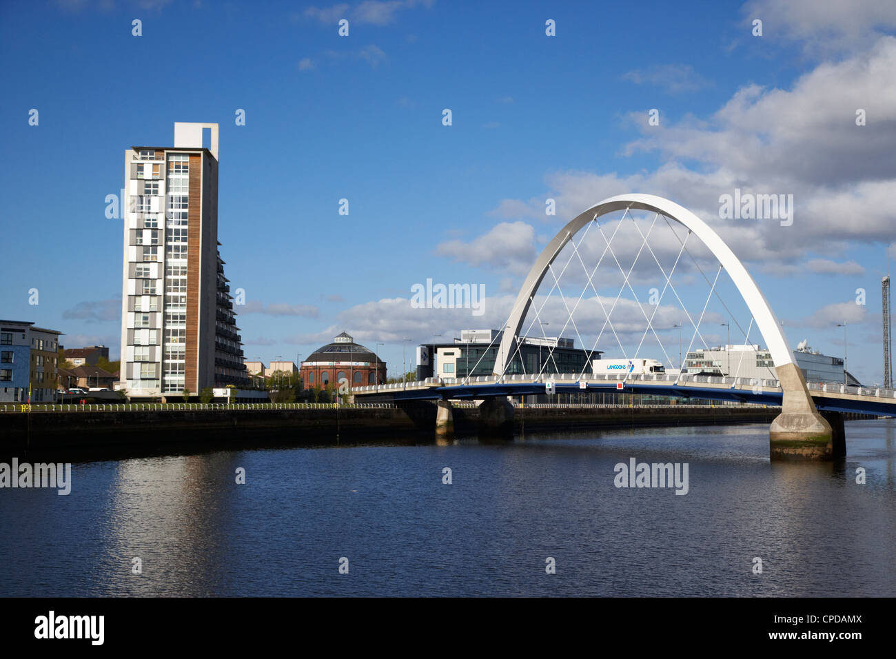 The Clyde Arc bridge over the river clyde and riverside apartments in