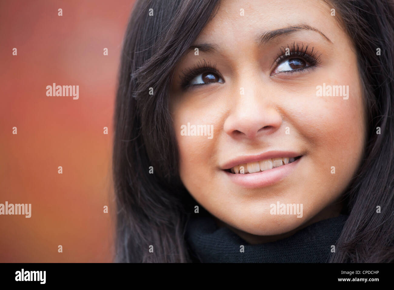 Smiling Hispanic teenager Stock Photo