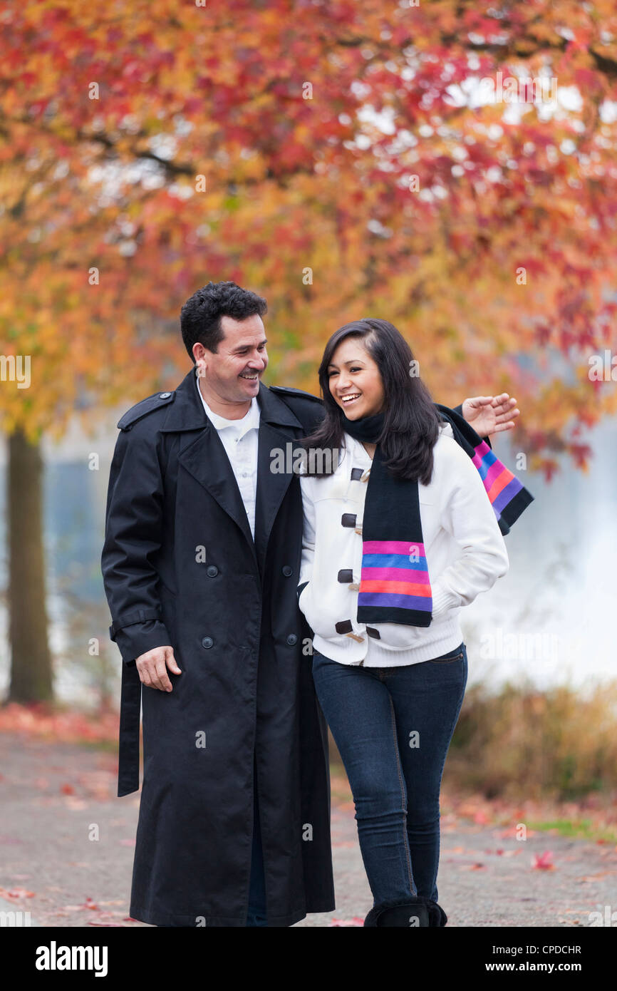 Two Girls Walking Arm In Arm High Resolution Stock Photography And Images Alamy