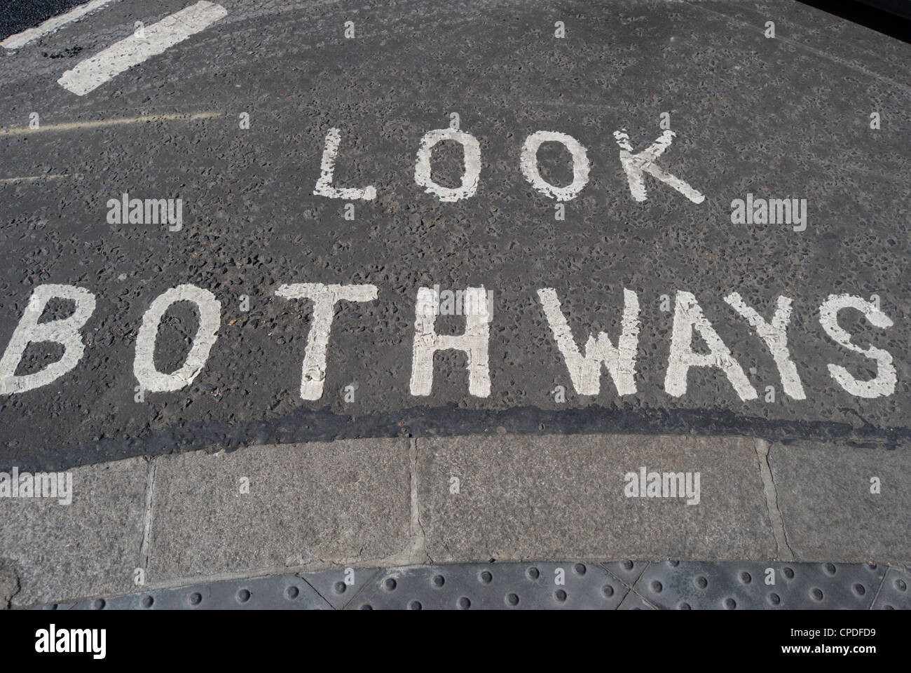 british look both ways road marking Stock Photo
