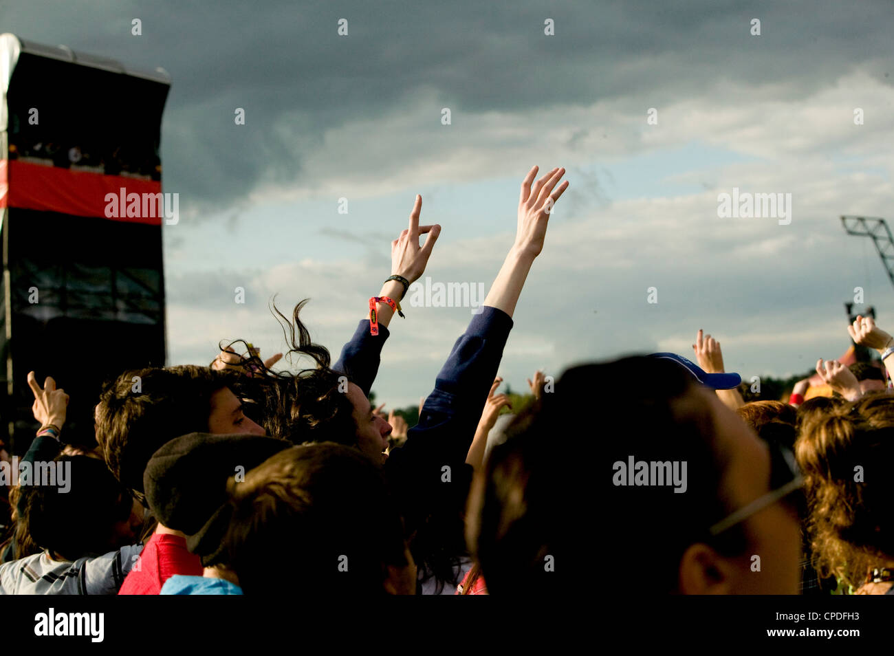 Hands in the air cheering at a music festicval Stock Photo - Alamy