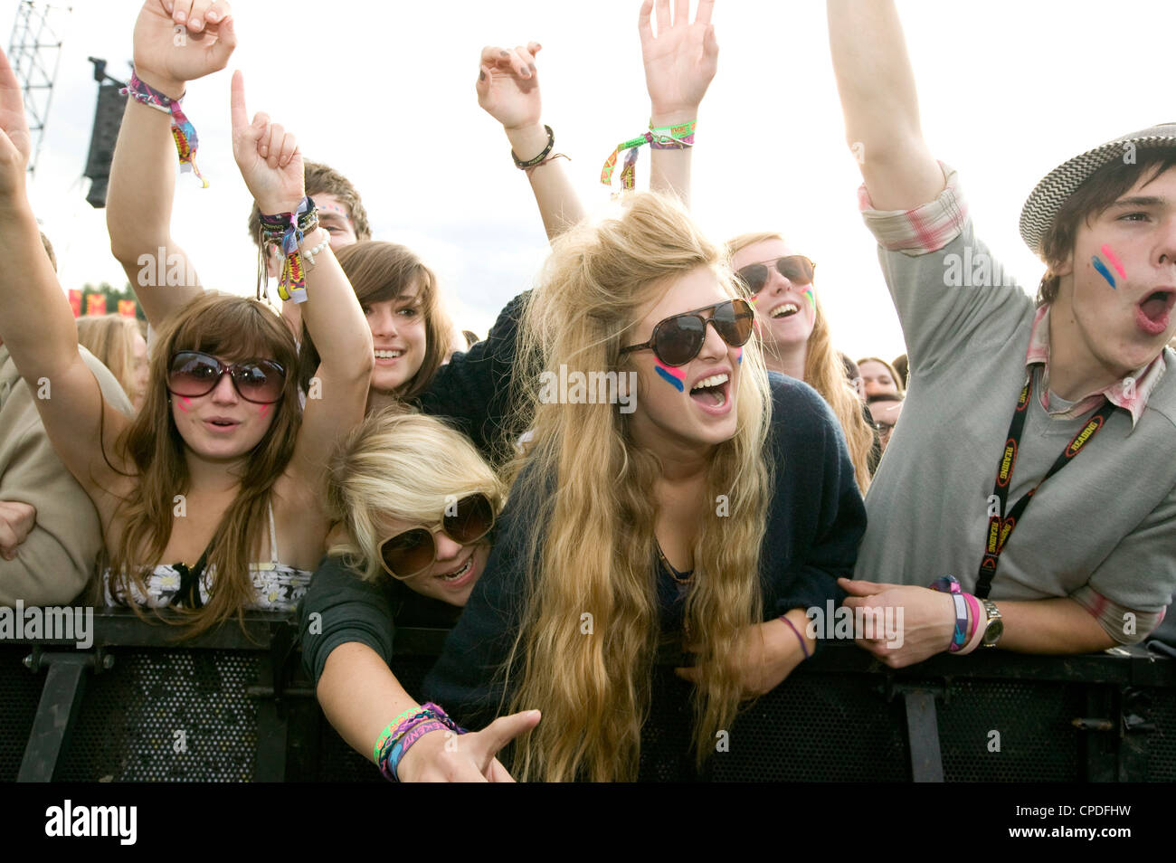 Crowd in front row screaming at a music concert Stock Photo - Alamy