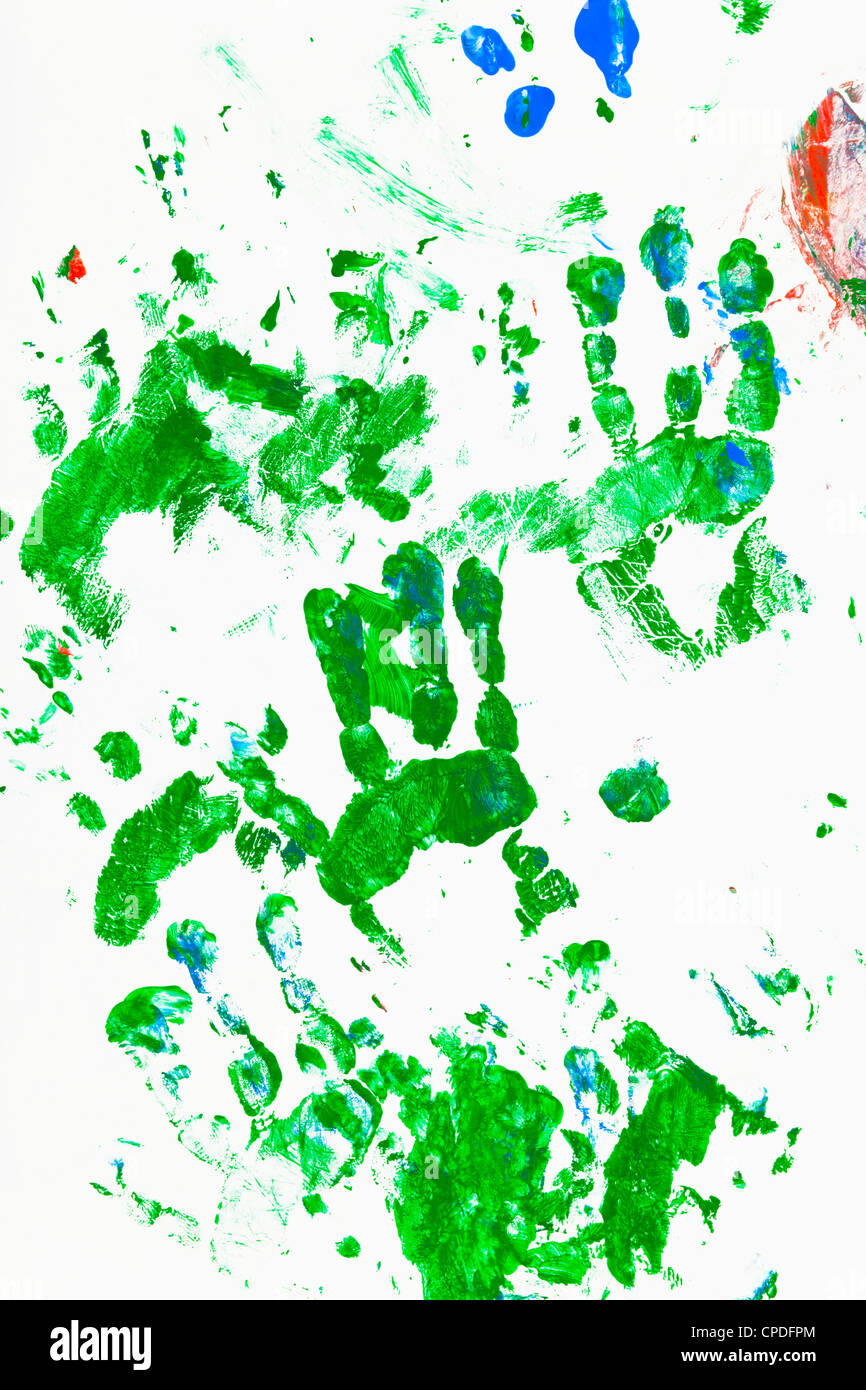 Watercolor prints of children's hands in green Stock Photo