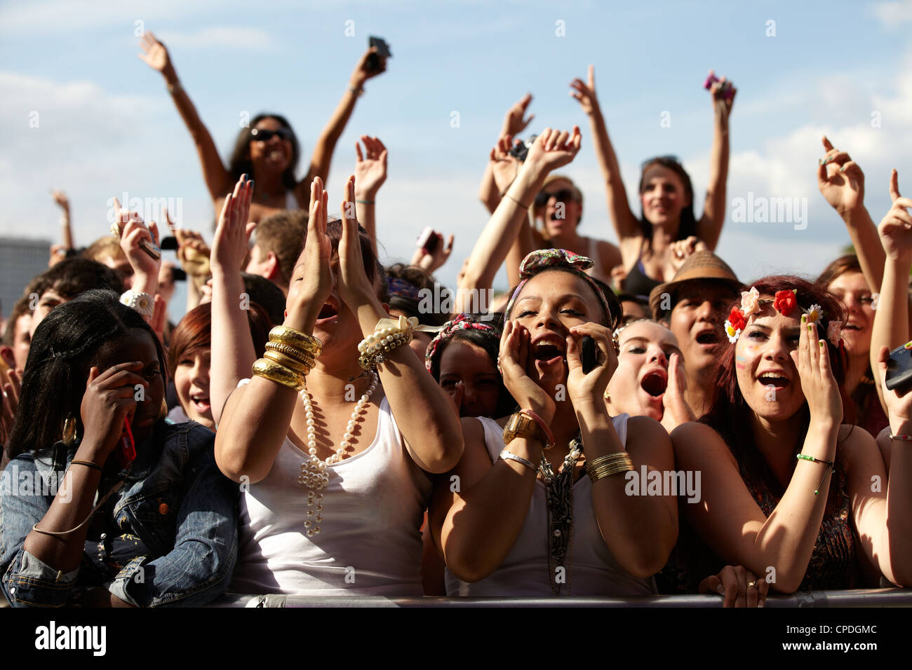 Crowd cheering in front row at a music festival Stock Photo Alamy