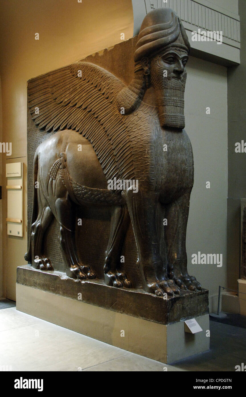Colossal statue of a winged lion with a human face. 865-860 BC. From Northwest Palace of Ashurnasirpal II. Nimrud. Stock Photo