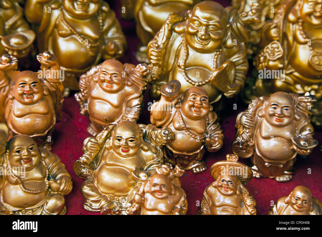 Mini Buddha figures for sale in a shop in Mumbai, India, Asia Stock Photo