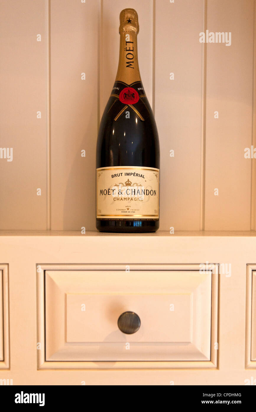 Single Bottle of Champagne on Shelf Stock Photo Alamy