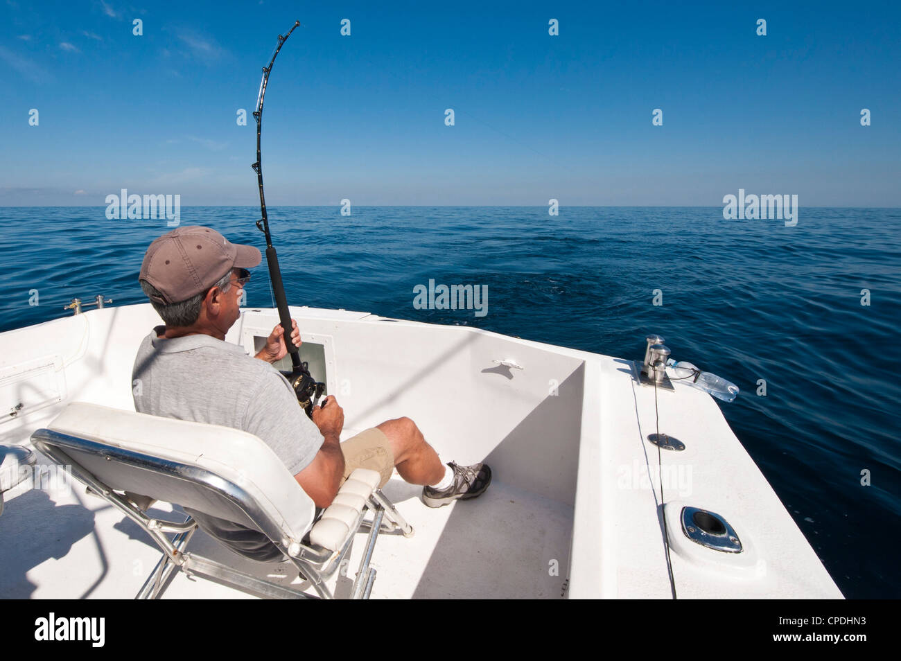 Deep Sea Fishing Reel on a boat during sunrise . High quality photo Stock  Photo - Alamy