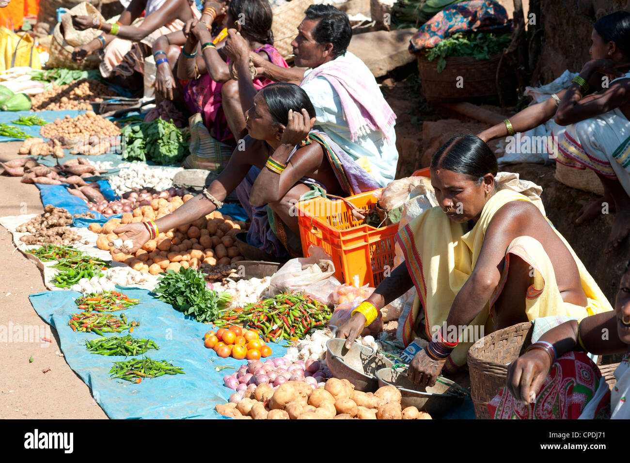 Mali tribeswomen selling vegetables at weekly market, Rayagader, Orissa, India, Asia Stock Photo