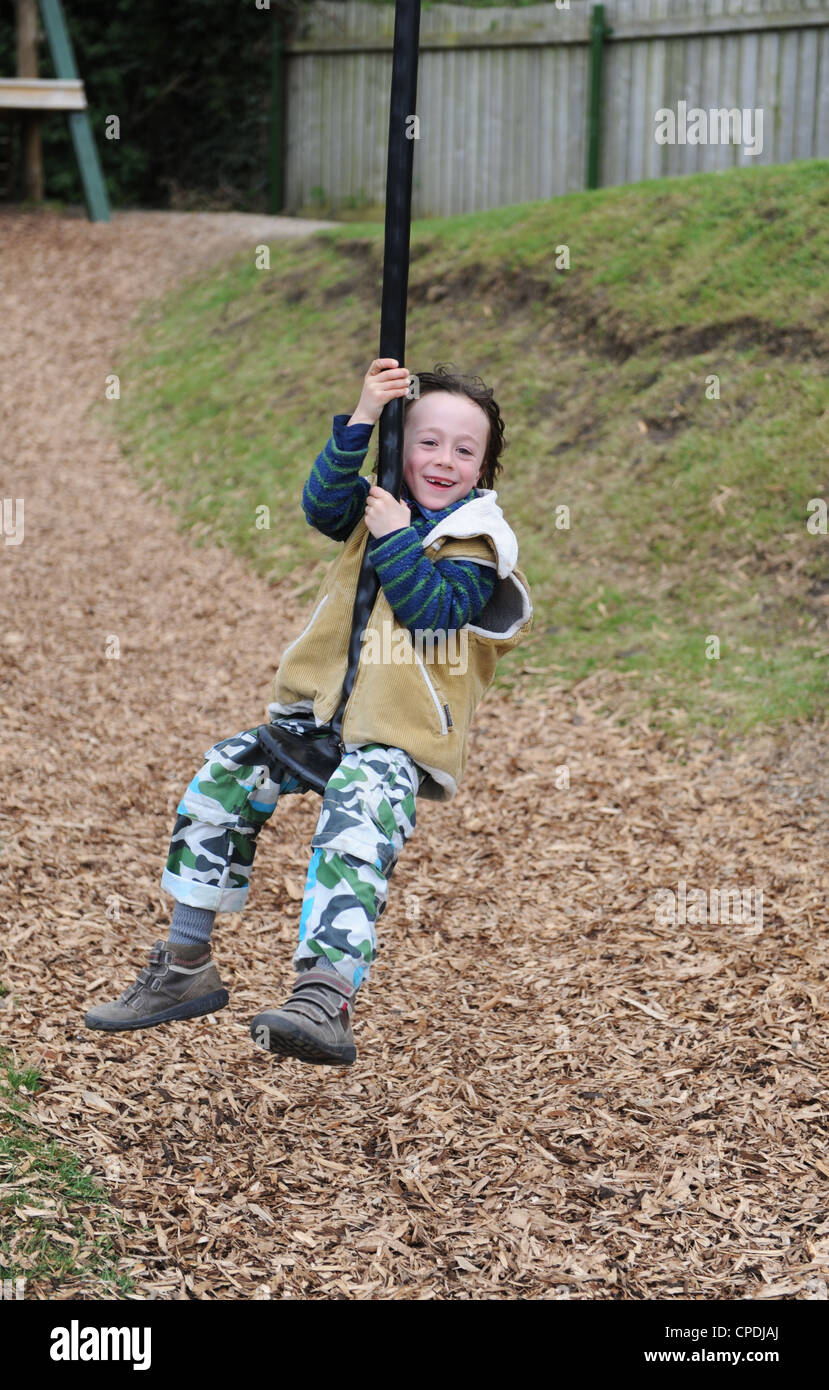 7 year old boy on a zipwire at Newby Hall near Ripon in North Yorkshire, Uk Stock Photo