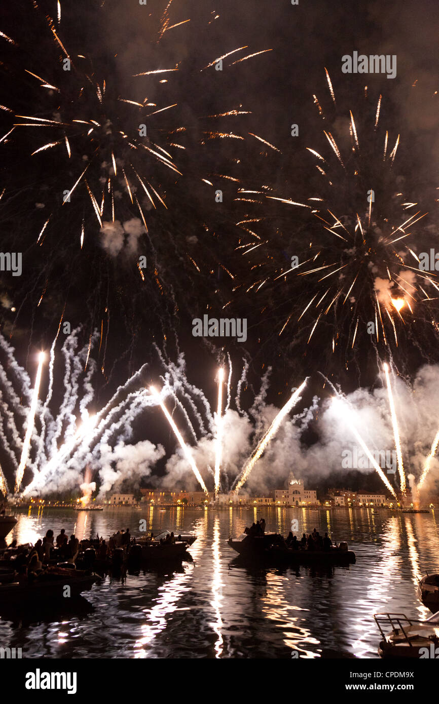The amazing fireworks display during the night of Redentore celebration in the basin of St. Mark, Venice,Veneto, Italy, Europe Stock Photo